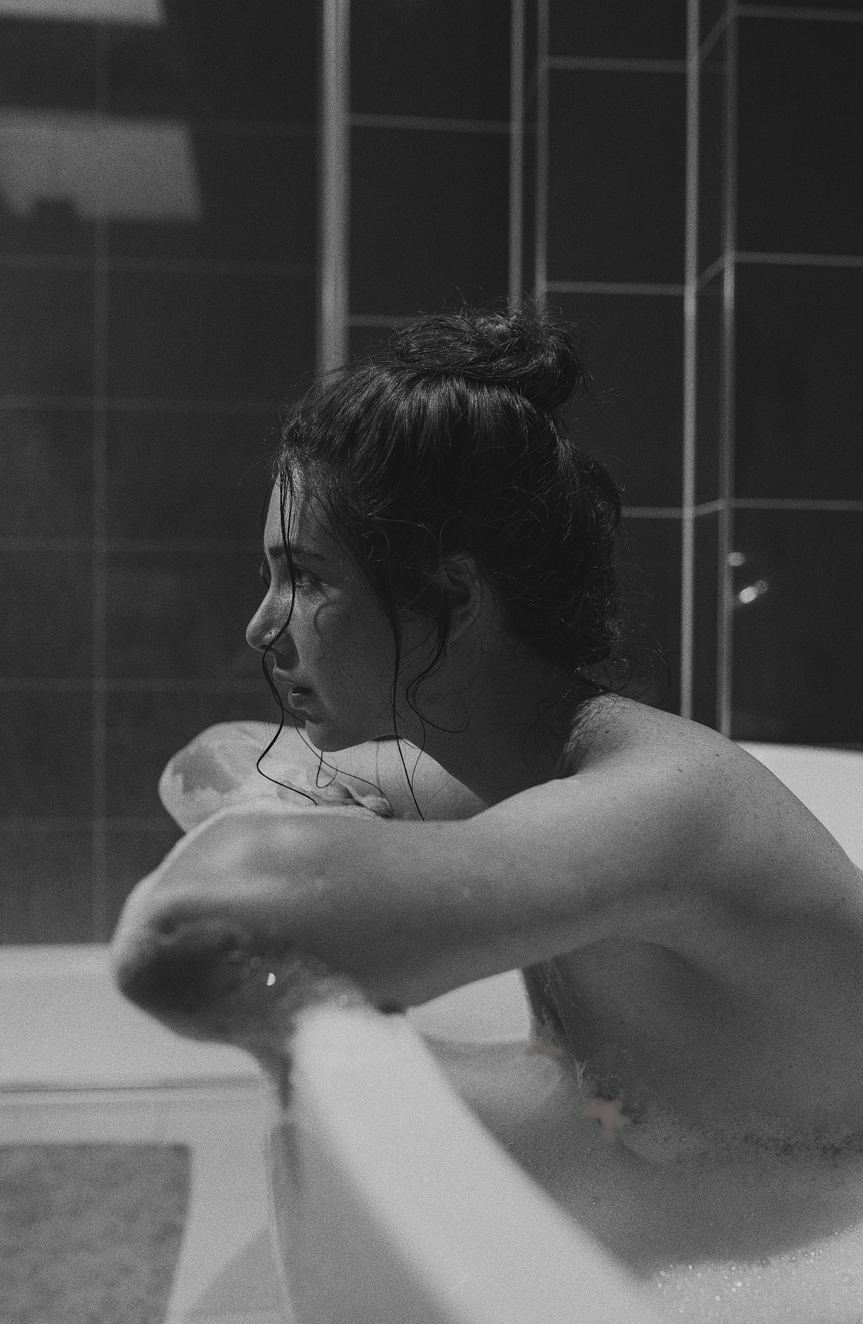 Black and white portrait, bathroom window light